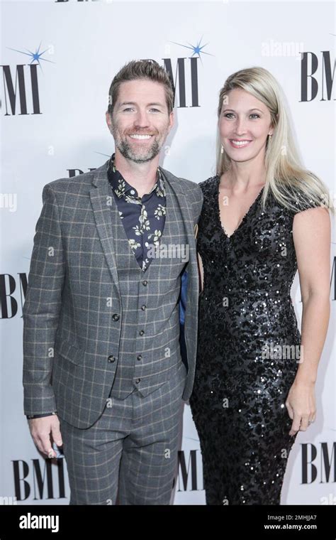 josh turner left and his wife jennifer ford arrive at 67th annual bmi country awards