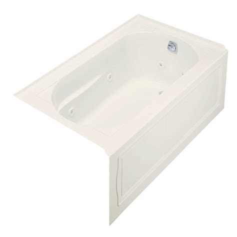 Hydromassage flow and direction can be controlled at each jet. KOHLER Devonshire 5 ft. Acrylic Right Drain Rectangular ...