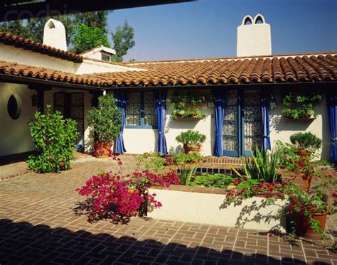 Spanish Style Ranch Homes With Courtyards Small Lily Pad Covered Pond