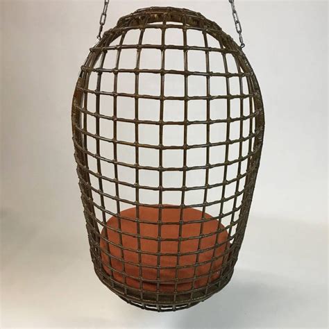 As with dining chairs, you may find a wicker recliner that features only wicker construction in one section, with wood comprising the rest of the construction. Mid Century Woven Rattan Hanging Egg Chair For Sale at 1stdibs
