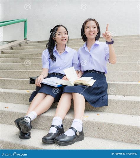 Cute Asian Thai High Schoolgirls Student Couple Pointing Stock Image
