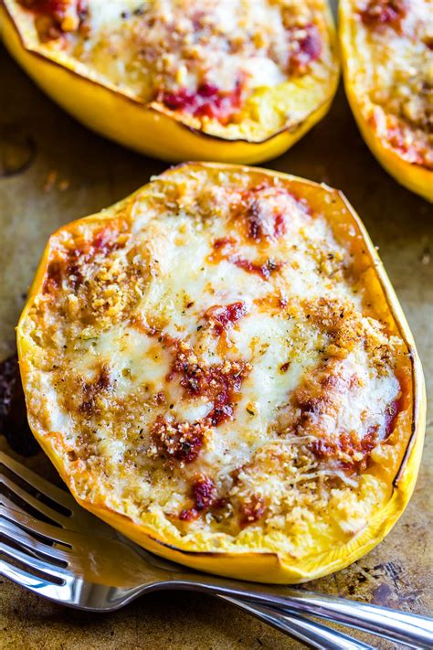 The chicken is cooked in the slow cooker to make it easy! Spaghetti Squash Parmesan Recipe - Peas and Crayons