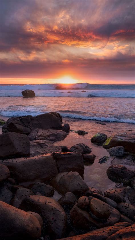 Download Wallpaper 938x1668 Sunset Sea Shore Stones Landscape