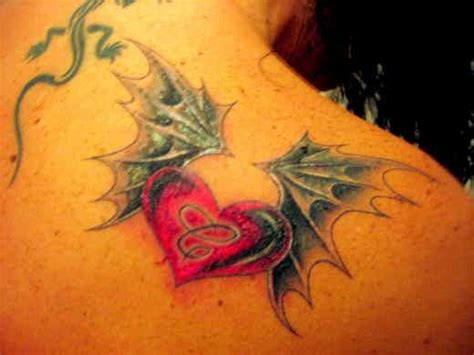 Wings Tattoo 81 Heart Wings Tattoos Are Attached To Any Meaning At
