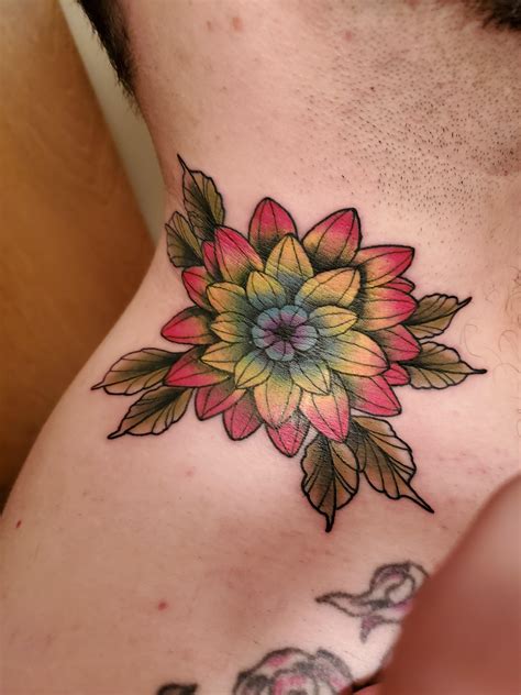 A queer neck tattoo of rebellion by Zion Guzman (Wintership Tattoo; Eau