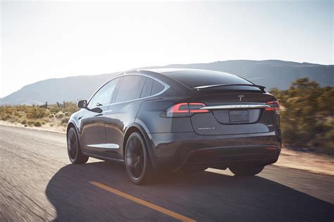 Tesla Model X Review Trims Specs Price New Interior Features Exterior Design And