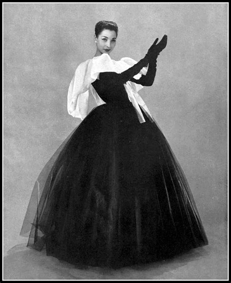 Renée Breton In Full Skirted Sheer Black Silk Tulle Gown Illuminated By