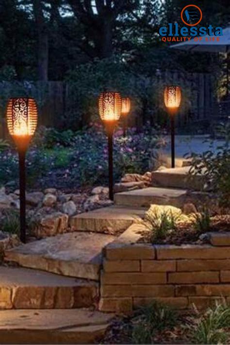 These solar flame light torches have a charging pad on the top side. Outdoor Solar Flame Flickering Light Torch | Backyard ...