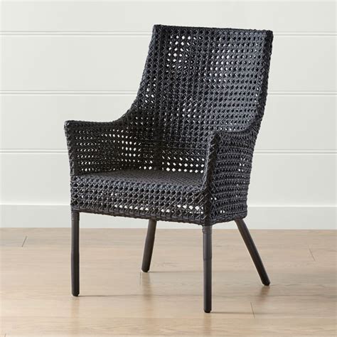 Maluku Black Rattan Dining Arm Chair Reviews Crate And Barrel