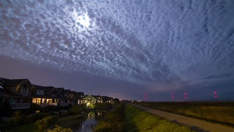 3 Shots Of Cloudy Night Sky In Residential Area With