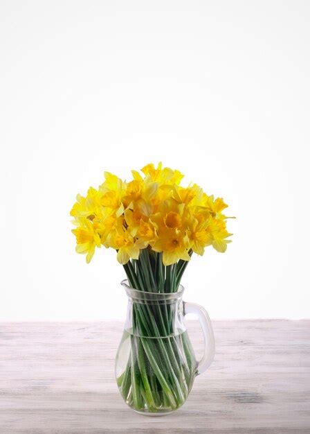 Premium Photo Yellow Daffodils In Jar