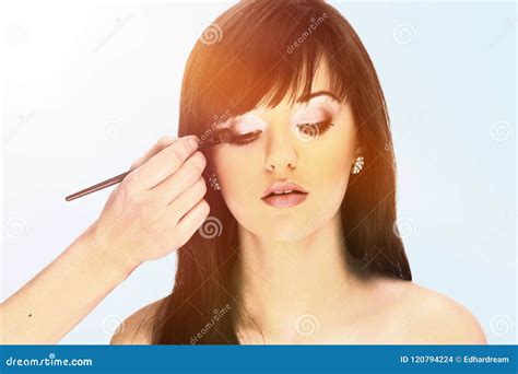 Makeup Artist Applies Eye Shadow Beautiful Woman Face Stock Photo