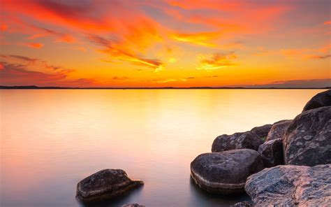 Download Wallpaper 3840x2400 Sunset Stones Rocks Horizon Sea 4k