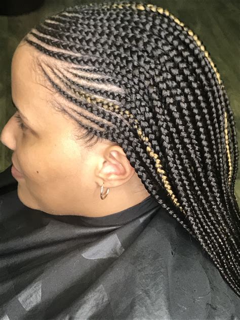 Cornrows With Single Braids