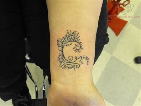 The accumulated raindrops that fall to the ground from the branches of a weeping willow tree, resemble teardrops. Cool Weeping Willow Wrist Tattoo