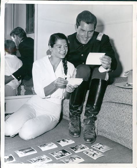 Jeffrey Hunter And His Wife Examine Production Shots On The Set Of Sergeant Rutledge