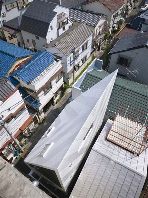Severe angles and impressive stepped cantilever volumes set this home apart from any other. Angled roof house stands out in the city | Modern House ...