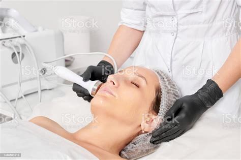 Cosmetologist Makes Ultrasound Skin Tightening For Rejuvenation Woman