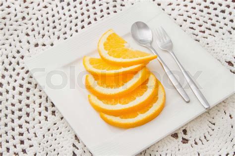 Orangen In Scheiben Geschnitten Auf Whiteplate Stock Bild Colourbox