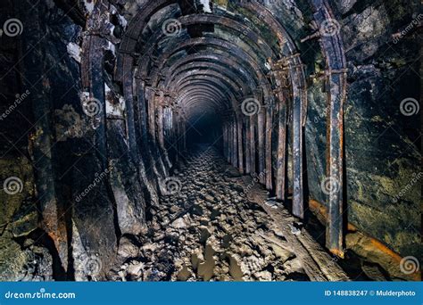 Dark Abandoned Coal Mine with Rusty Lining Stock Image - Image of