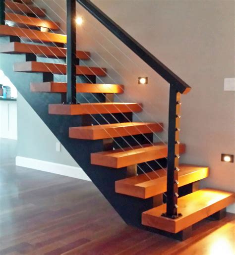Mini hand railing desisgn / bent iron design interior railing with a distressed wood. Stair Railing Ideas