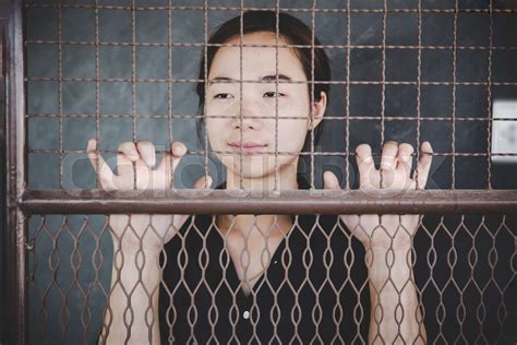 Beautiful Young Girl Behind The Bars Stock Image Colourbox