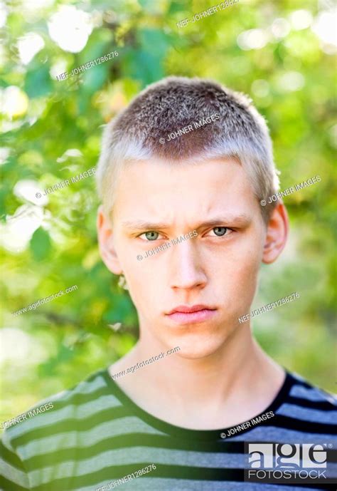 Portrait Of Angry Teenage Boy Stock Photo Picture And Royalty Free