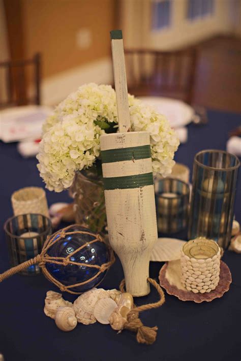 You can take them to a whole new level by discovering new elements that may further add to the beauty of these centerpieces. Rehearsal Dinners Photos - Wooden Buoy Centerpiece ...