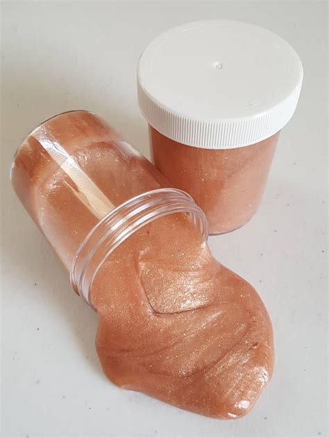 The Classiest And Trendiest Metallic Rose Gold Slime Clear Base Rose