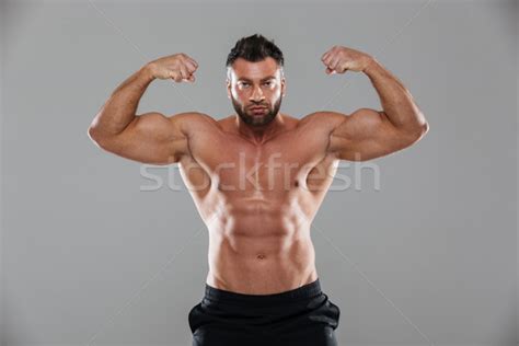 Portrait Of A Muscular Strong Shirtless Male Bodybuilder Stock Photo