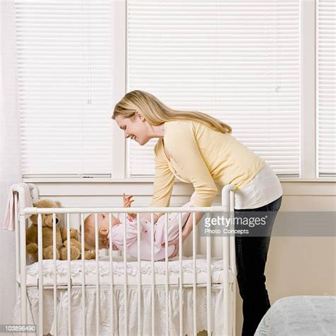 Mom And Baby Bed Photos And Premium High Res Pictures Getty Images