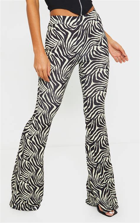 Zebra Slinky Print Flared Pants Pants Prettylittlething Ksa