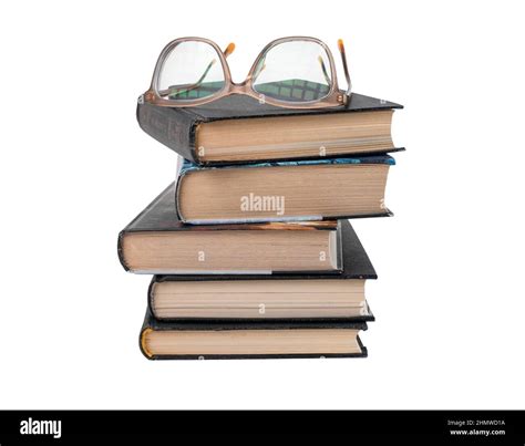 Books Stack With Eyeglasses Isolated On White Background Education And Reading Leisure Concept