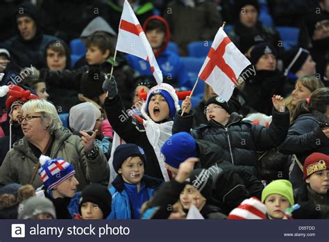 .a beautiful england football fan, ideal for birthday cards, scrapbooking, football flags and more. Young England football fans waving flags at a match UK ...