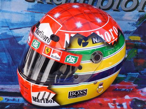 This time in a flame theme as per his karting helmet. Michael Schumacher - Senna Tribute, the best helmet ever ...