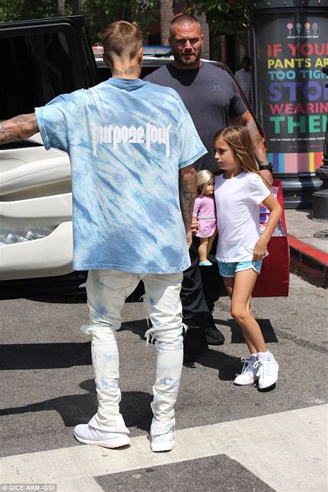 Justin Bieber Holds Little Sister Jazmyns Hand As He Takes Her