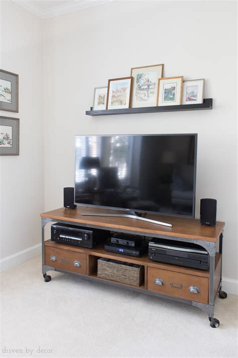 Maybe you would like to learn more about one of these? Adding a Shelf Above the TV: A Simple Decorating Solution | Driven by Decor