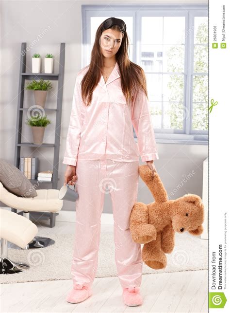 Sleepy Woman In Pyjama With Teddy Bear Royalty Free Stock Photos