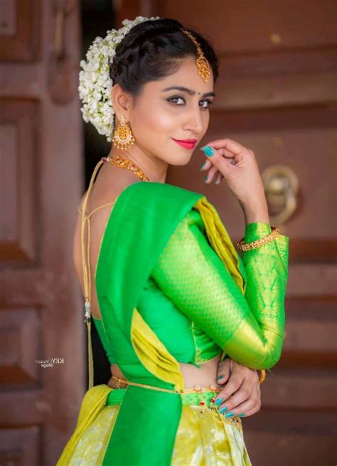 Telugu Tv Actress Varshini Sounderajan Photos In Green Lehenga Choli