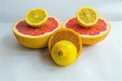 Citrus Fruits Being Cut In Half Stock Photo Image Of Group Mixed