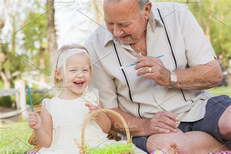 Grandpa And Granddaughter On Easter High Quality People Images ~ Creative Market