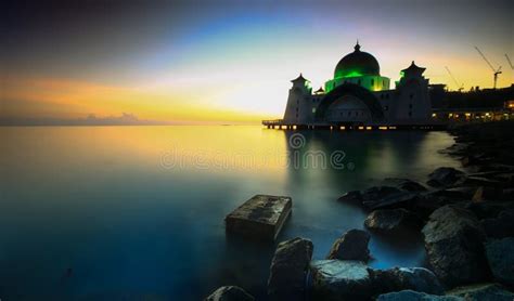 Amazing Straits Mosque Of Malacca During Sunrise With Reflection Stock
