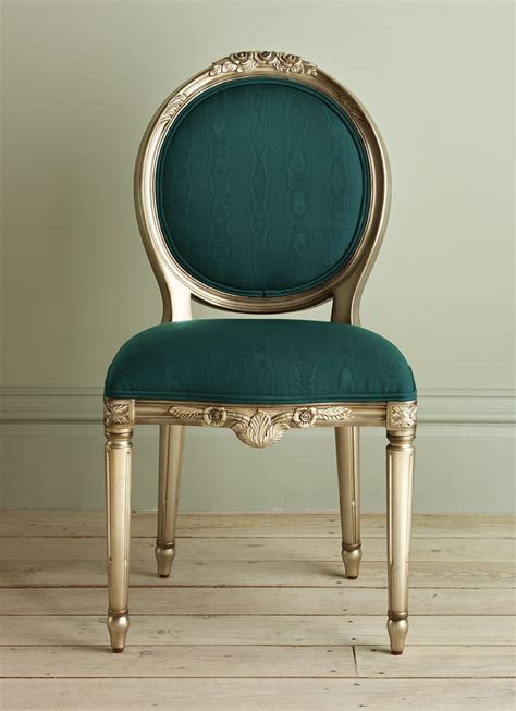 Floral Leafed And Upholstered Chair In Teal Fabric From And So To Bed