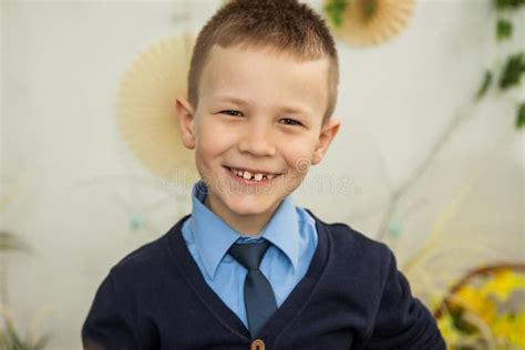 The Boy Smiles With Crooked Teeth Stock Photo Image Of Open Child