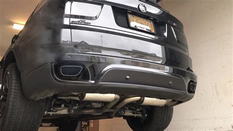 Akrapovic titanium exhaust with signature carbon fibre tips. Bmw X5 50i Custom exhaust sound - YouTube