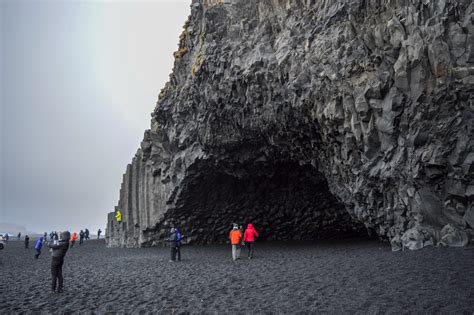 Standing On Reynisfjara Beachs Black Sand At Vik In Iceland Ambition