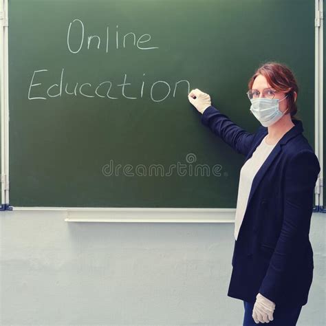 The Teacher Stands At The Blackboard And Asks Student Stock Image