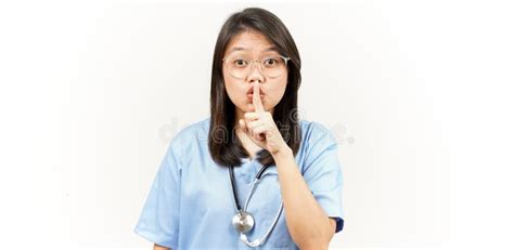 Shh Be Quiet Of Asian Young Doctor Isolated On White Background Stock