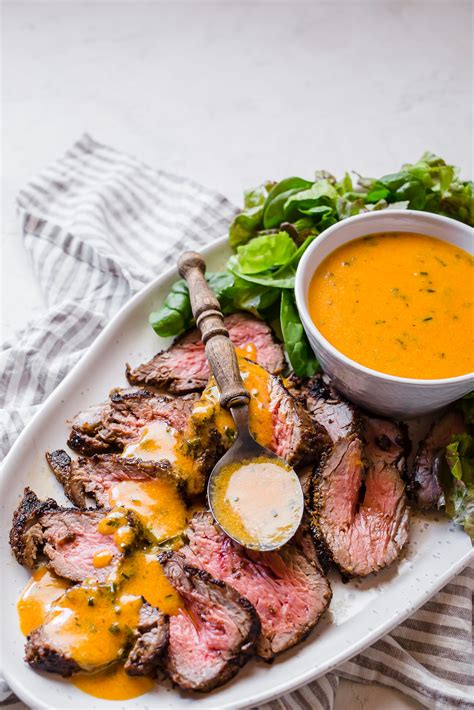 This tasty beef tenderloin recipe features a sauce made from red wine and shallots. Pepper-crusted beef tenderloin with herbed steak sauce | Recipe in 2020 | Stuffed peppers, Beef ...