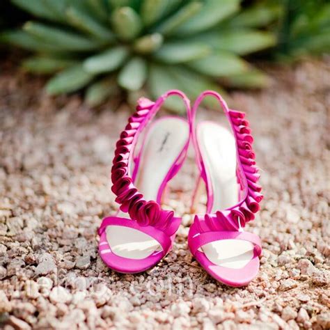 I know there are always brides looking for something blue wedding shoes and lately many have been searching for teal shoes to match their. Hot Pink Wedding Shoes